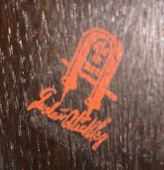 Gustav Stickley early red decal used 1904-1906.